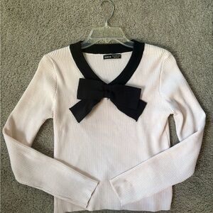 SHEIN Light Pink Sweater with Black Bow Accent
